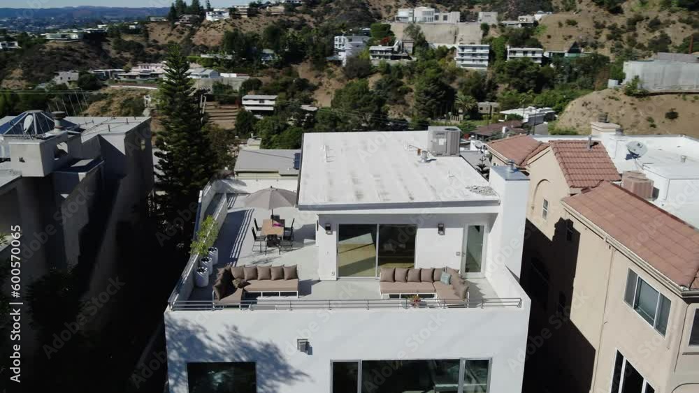 Aerial Panning Shot Of Bungalows On Hills In Neighborhood, Drone Flying Over Houses On Sunny Day - Los Angeles, California Aerial Panning Shot Of Bungalows On Hills In Neighborhood, Drone Flying Over Houses On Sunny Day - Los Angeles, California