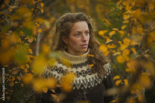 woman portrait in colourful autumn nature