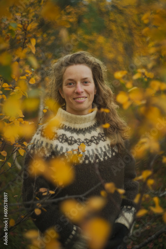 woman portrait in colourful autumn nature