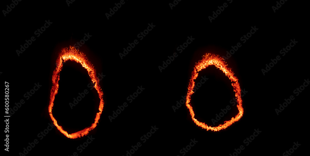 burning paper, glowing edge of paper on a black background burning paper, glowing edge of paper on a black background