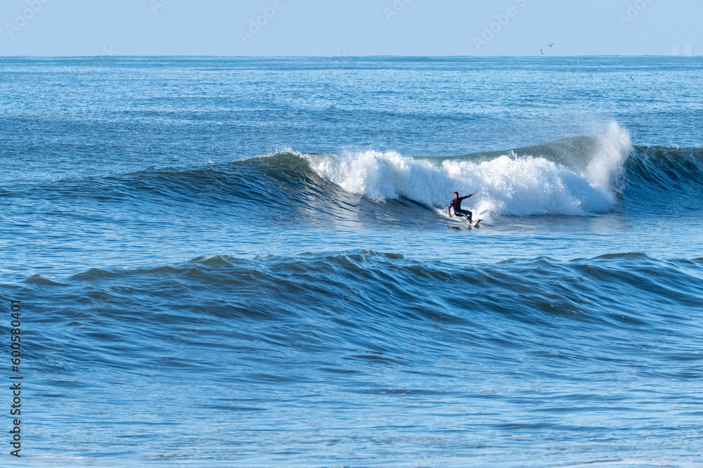 Man surfing atlantic ocean waves Man surfing atlantic ocean waves