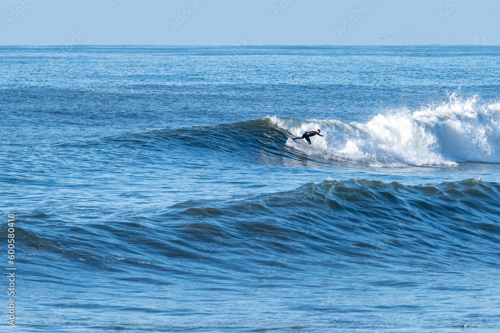 Man surfing atlantic ocean waves Man surfing atlantic ocean waves