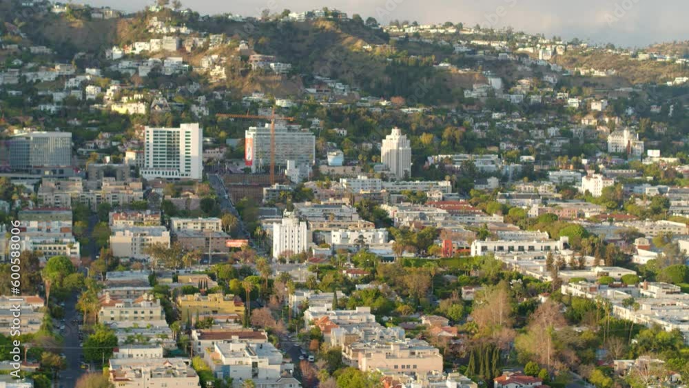 Aerial Panning Shot Of Residential Buildings On Hill In Suburb, Drone Flying Over Human Settlement - Los Angeles, California Aerial Panning Shot Of Residential Buildings On Hill In Suburb, Drone Flying Over Human Settlement - Los Angeles, California