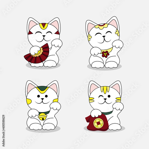 Different cute maneki neko (beckoning cats) on white background