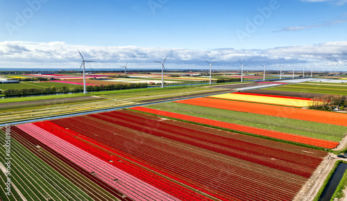 The modern windmills with a Tulip barn form the drone view 