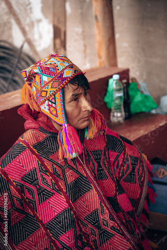 Andean man from Cusco making a payment to the land and cleaning, tradition and ancestral custom

