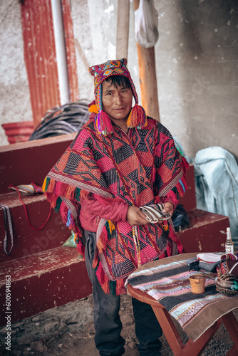 Andean man from Cusco making a payment to the land and cleaning, tradition and ancestral custom
