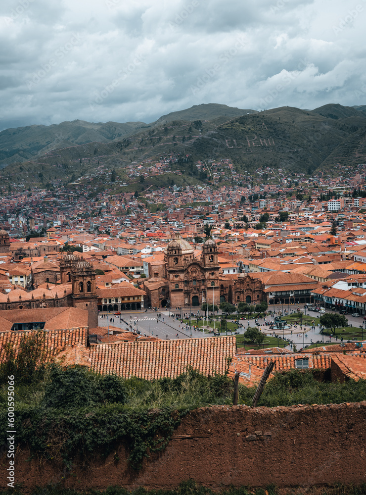 Panoramic view of the entire Imperial City of Cuzco, the navel of the world, traditional orange roofs
