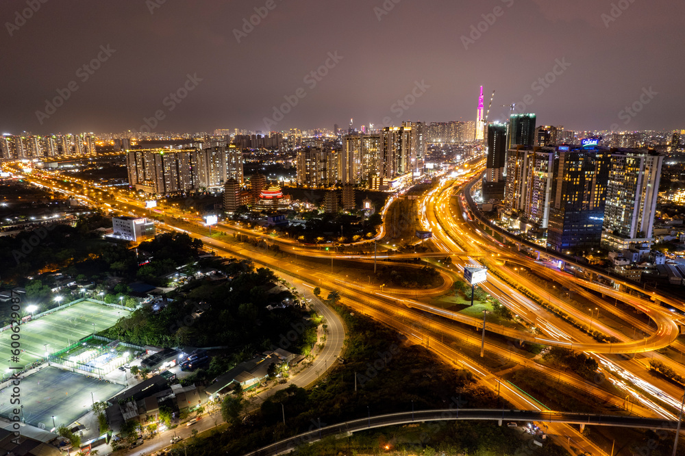 Sunset at overpass bridges in Cat Lai juntion, Ho Chi Minh city, Vietnam. Photos taken in April 2023.