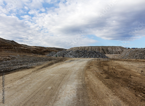 Slika na platnu bulk created road, rocks from the ground - limestone material of volcanic origin, mountainous terrain, close-up