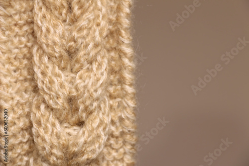 Knitted pattern pigtail. Place for text