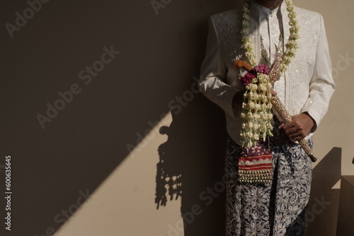 white kebaya details for traditional Javanese Indonesian weddings photo