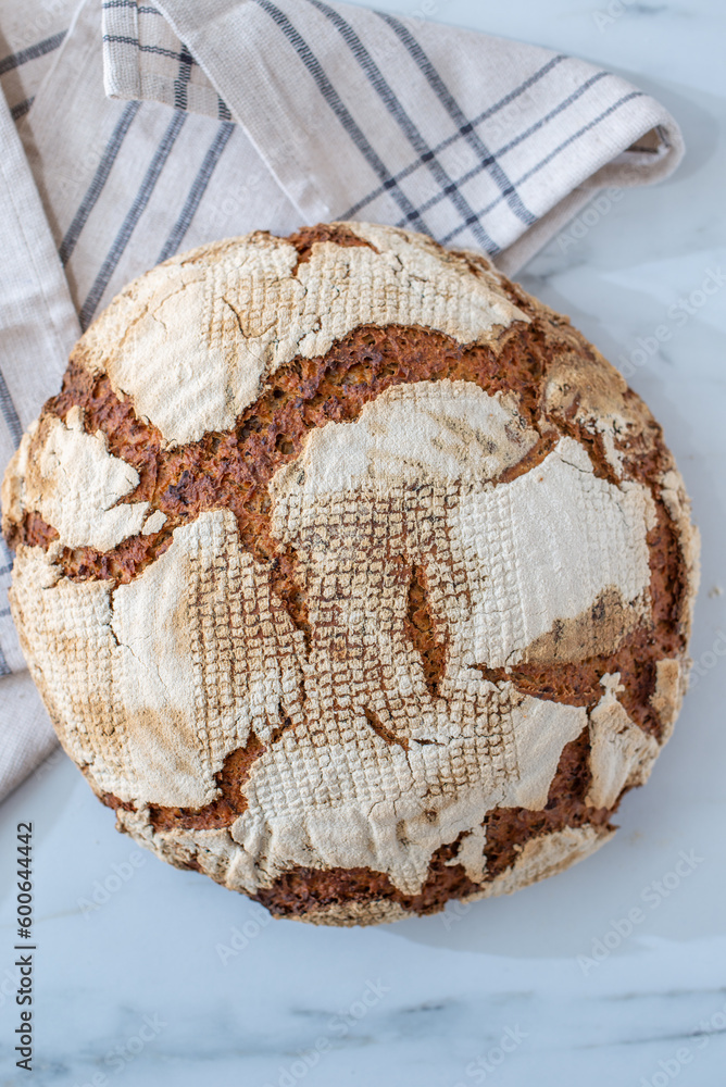 Home made whole grain bread on rustic wooden Home made whole grain bread on rustic wooden