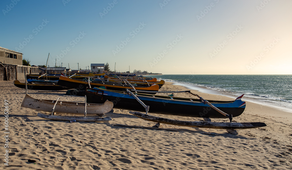 Traditional wooden fishing boats on the tropical beach of Anakao, Tulear, Madagascar. Ocean view with sandy beach