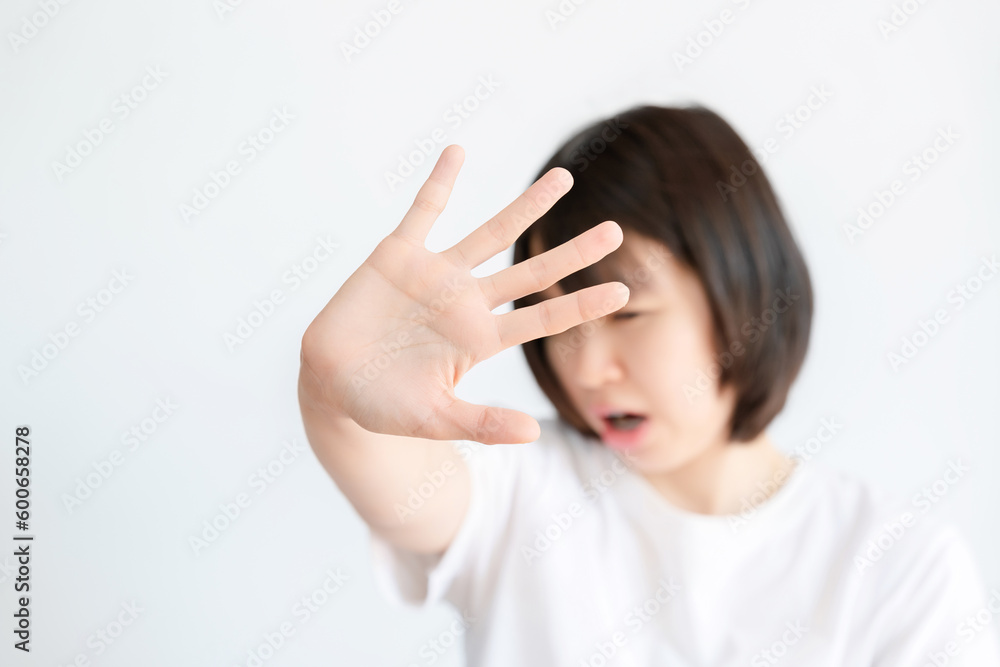 The woman raised her hand in refusal due to disgust that thing. The woman raised her hand in refusal due to disgust that thing.