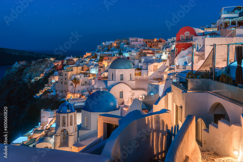 Paradise found in Santorini! This iconic image showcases the island's stunning blue domes, white houses, rugged caldera, and endless sea.