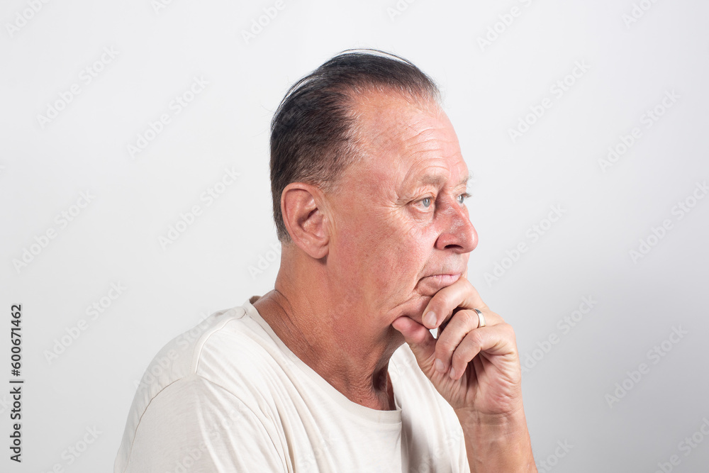 senior man thinking or try to remember alone closeup senior man thinking or try to remember alone closeup