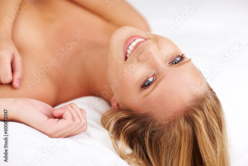 Bed, topless and portrait of relax happy woman in bedroom at home. Cosmetic or body care, confidence or proud for happy shirtless and female model with smile to promote health and feminine beauty