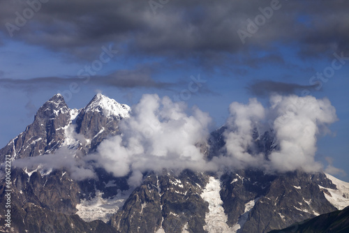 Mt. Ushba in clouds, Caucasus Mountains, Georgia, Svaneti.