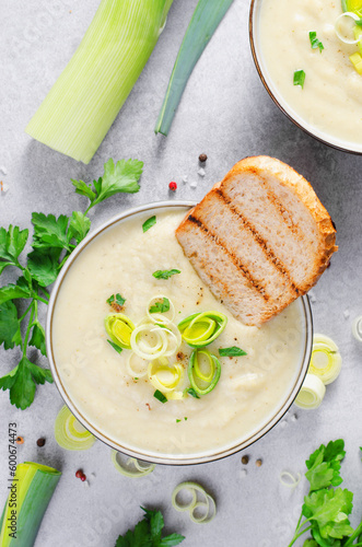 Leek Soup, Comfort Meal, Potato and Leek Creamy Soup, Vegetarian Food on Bright Background photo