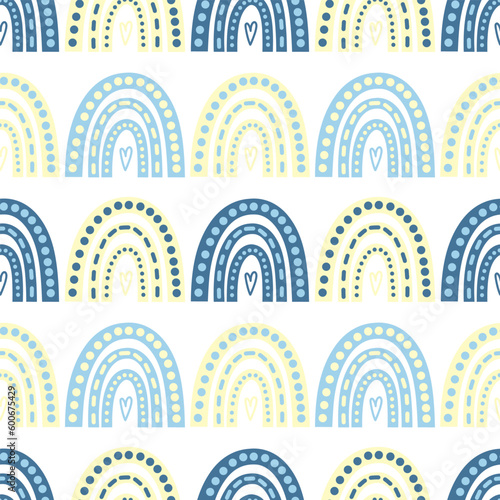 Cute, delicate seamless pattern with a rainbow on a white background. Doodles. Rainbow, stripes, dots, hearts. For the design of the children's room, wallpaper, textiles, fabric. Wrapping paper.