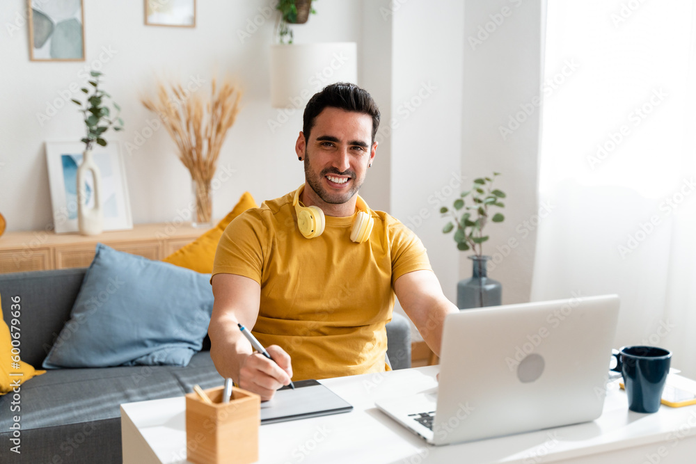 Graphic designer working from home. Graphic designer working from home.