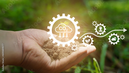 Icon concept circulating in hands for environment, society and governance. Networked connections on green background.