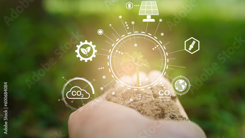 Icon concept circulating in hands for environment, society and governance. Networked connections on green background.
