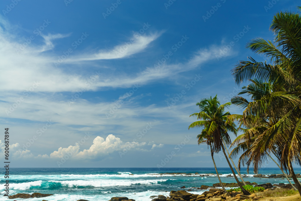 Blue sky with beautiful clouds on the shore of a tropical island