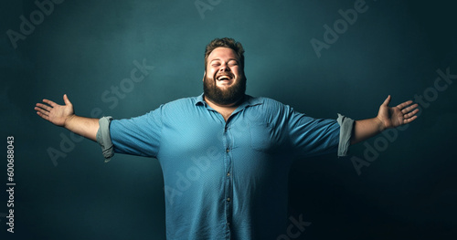 Portrait of confident happy caucasian middle aged man overweight, self-love concept,body-positivity, weight loss, body and health care, self loving plus size men