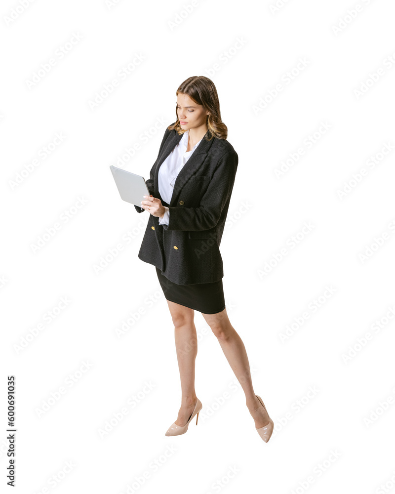 Portrait with attractive business woman wearing classical suit and heels holding tablet and working isolated on white background. Professional and personal growth Portrait with attractive business woman wearing classical suit and heels holding tablet and working isolated on white background. Professional and personal growth