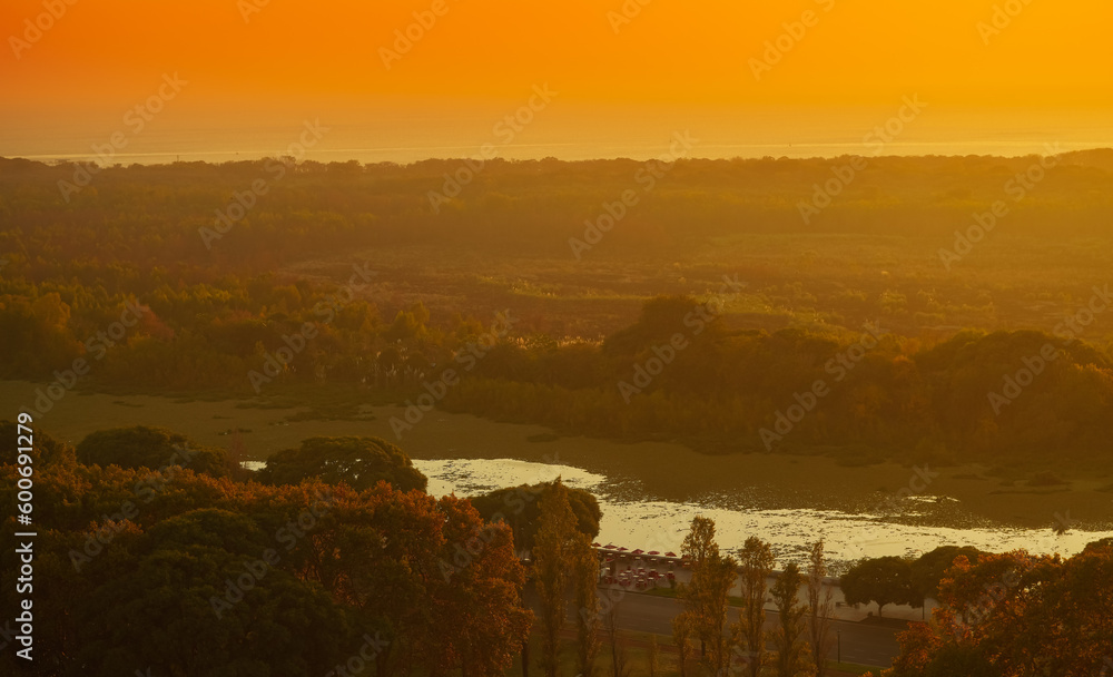 Sunrise over Costanera Sur Ecological Reserve in Buenos Aires. Landscape of a beautiful natural park in Argentina.