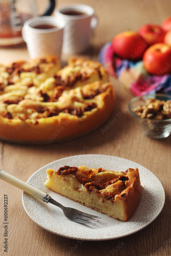 Apple pie with walnuts - typical autumn dish Apple pie with walnuts - typical autumn dish
