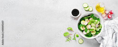Photography Fresh Salad with Radish, Cucumber and Lettuce on Bright Background, Healthy Vege