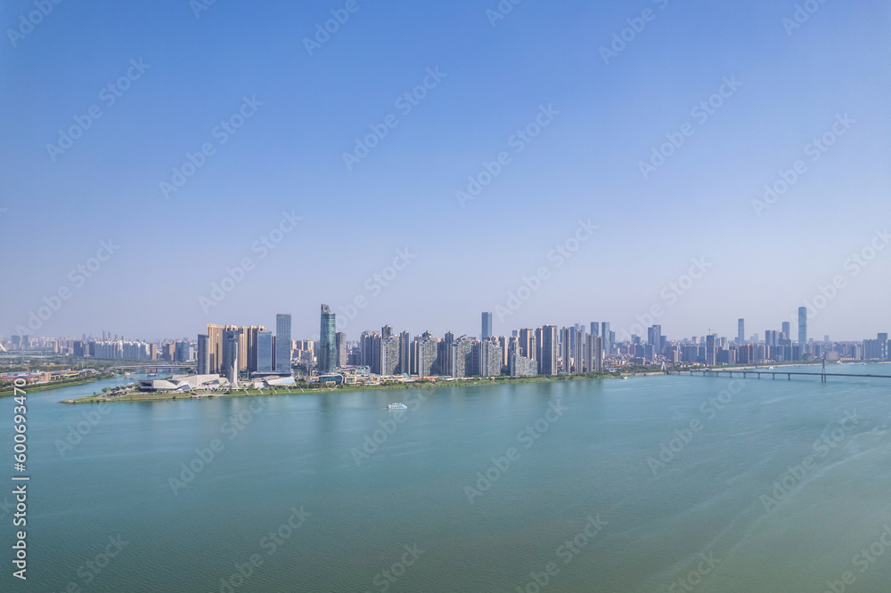 Naklejka premium Skyline of buildings on the east bank of Xiangjiang River in Changsha, China