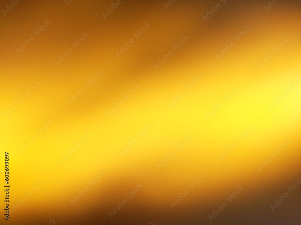 Fototapeta premium blurred background gradient gold color with abstract light