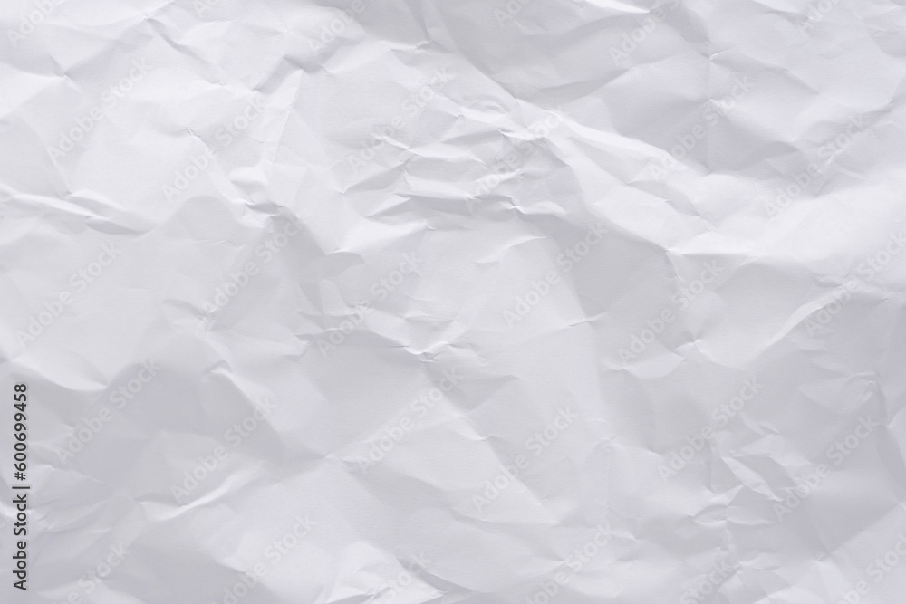 White crumpled paper texture background, clean white wrinkled paper, top view. White crumpled paper texture background, clean white wrinkled paper, top view.