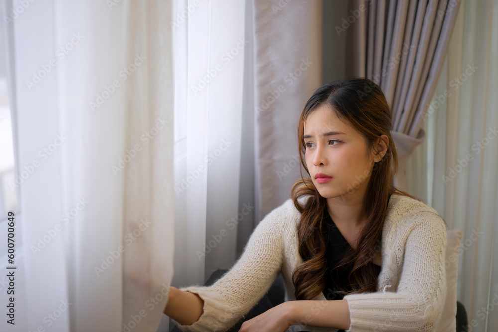 Pretty woman with sad emotion sit on sofa. Pretty woman with sad emotion sit on sofa.