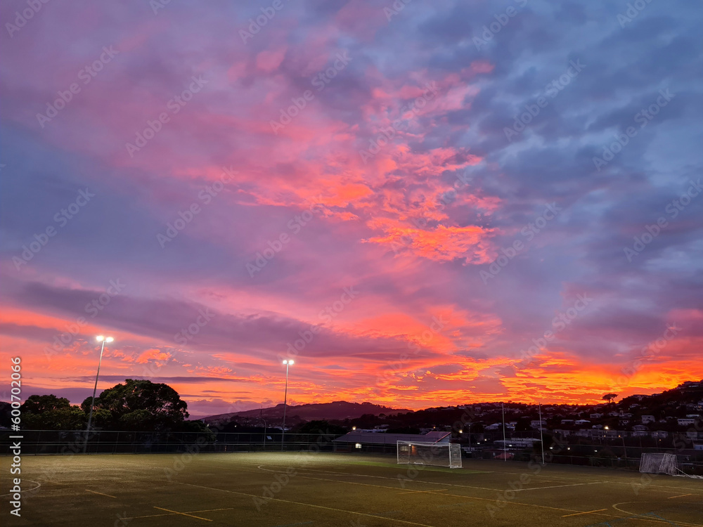 Empty football pitch at sunrise
