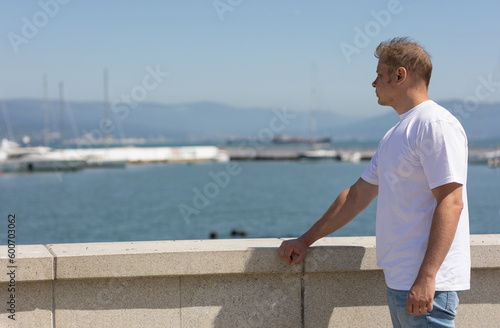 Young man on the embankment