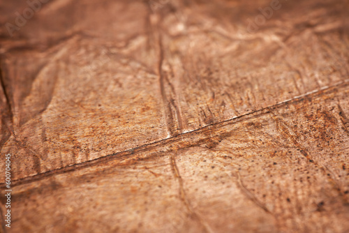 Extreme closeup of crumpled brass foil texture