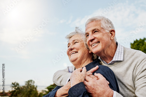 Obraz na plátne Sky, elderly couple and hug outdoors or happy in retirement or husband and wife in nature