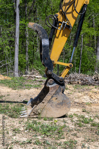 Hydraulics hoses on an excavator arm with bucket