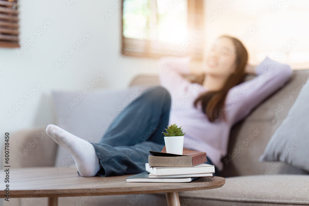Attractive Asian woman resting comfortable living room and sleep, Relax, Sofa, Lifestyle, selective focus Attractive Asian woman resting comfortable living room and sleep, Relax, Sofa, Lifestyle, selective focus