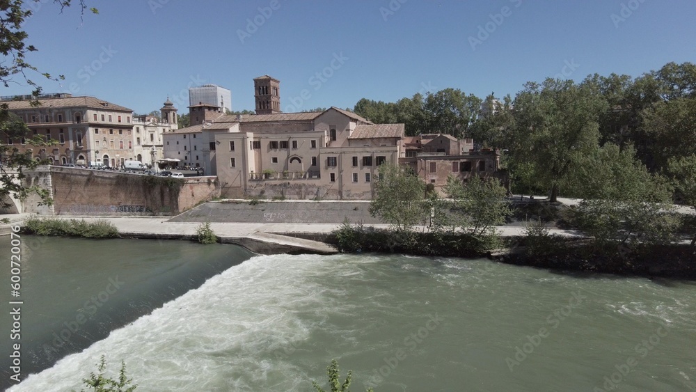 Italy, Rome 2023 - Isola Tiberina (Tiber Island) in Tevere river downtown of the city - tourist attraction sightseeing in the capital Italy, Rome 2023 - Isola Tiberina (Tiber Island) in Tevere river downtown of the city - tourist attraction sightseeing in the capital
