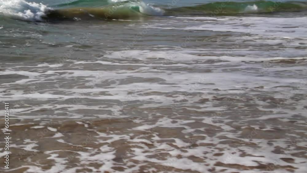 High Angle View Of Sea Waves Splashing On Shore At Beach During Sunny Day - Kauai, Hawaii High Angle View Of Sea Waves Splashing On Shore At Beach During Sunny Day - Kauai, Hawaii