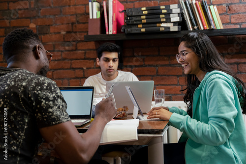 Group of students studying together photo