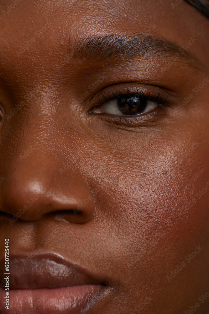 Close-up of woman face looking at camera Close-up of woman face looking at camera