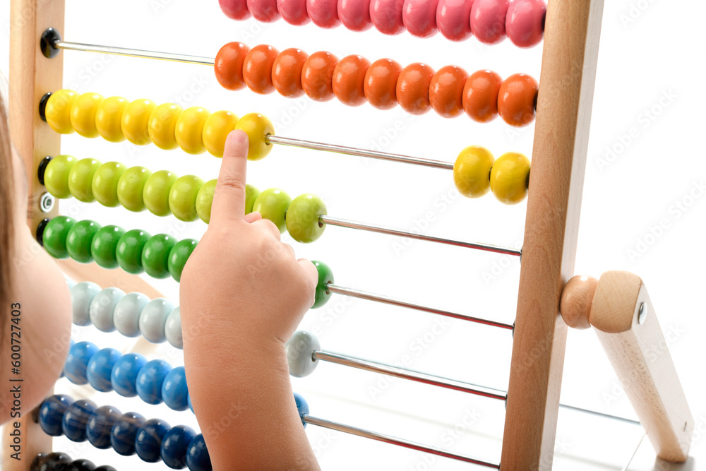 Little child playing with abacus close-up Little child playing with abacus close-up
