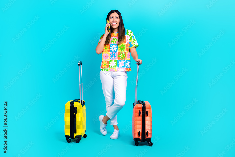 Full length photo of young girl no payment free tariff viber call smartphone tourist look mockup isolated on aquamarine color background Full length photo of young girl no payment free tariff viber call smartphone tourist look mockup isolated on aquamarine color background